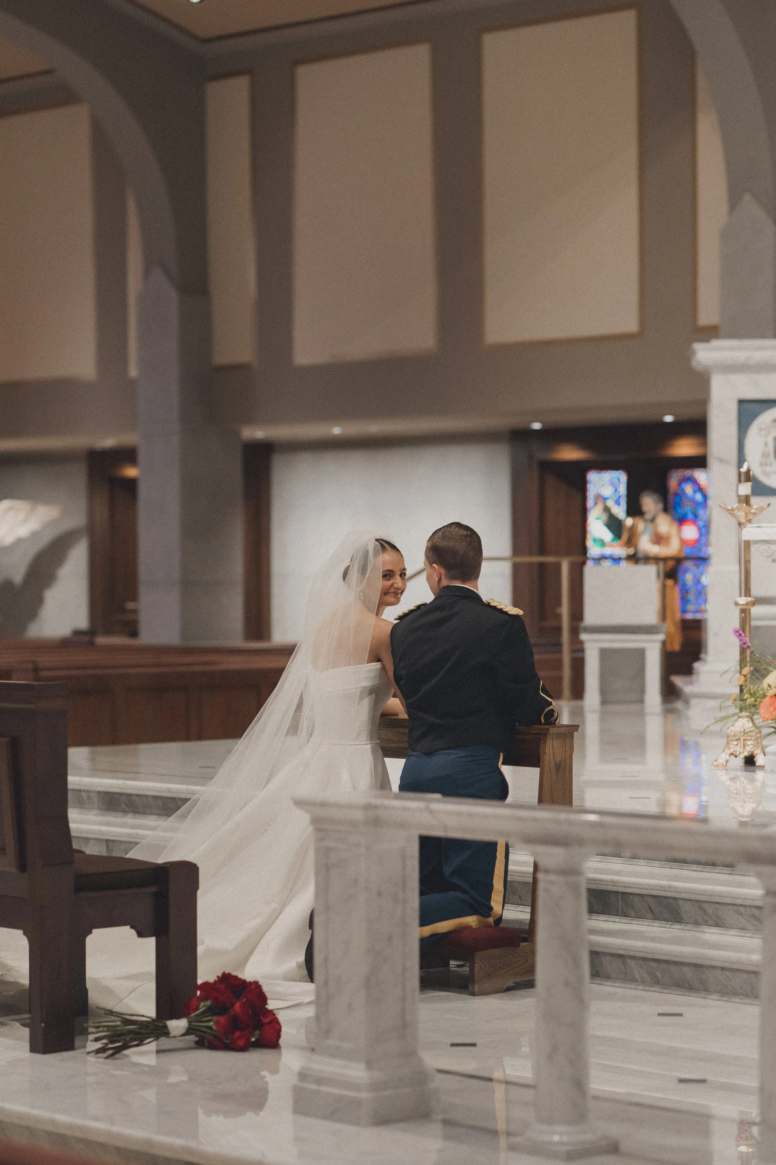 BRIDE GROOM WEDDING CEREMONY CATHOLIC CHURCH MASS KNEELING