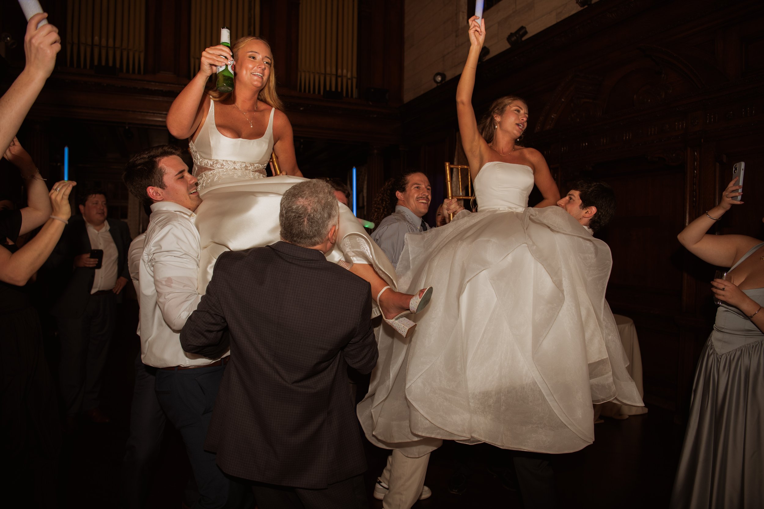 WEDDING RECEPTION DANCING BRIDES ON CHAIRS STRATHMORE MANSION