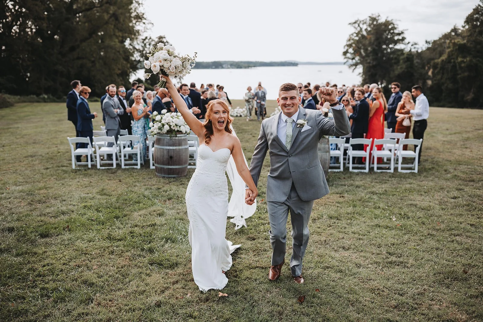 bride groom bridal bouquet ground flowers wine barrel floral arrangement aisle catholic wedding ceremony bohemia manor farm chesapeake city maryland