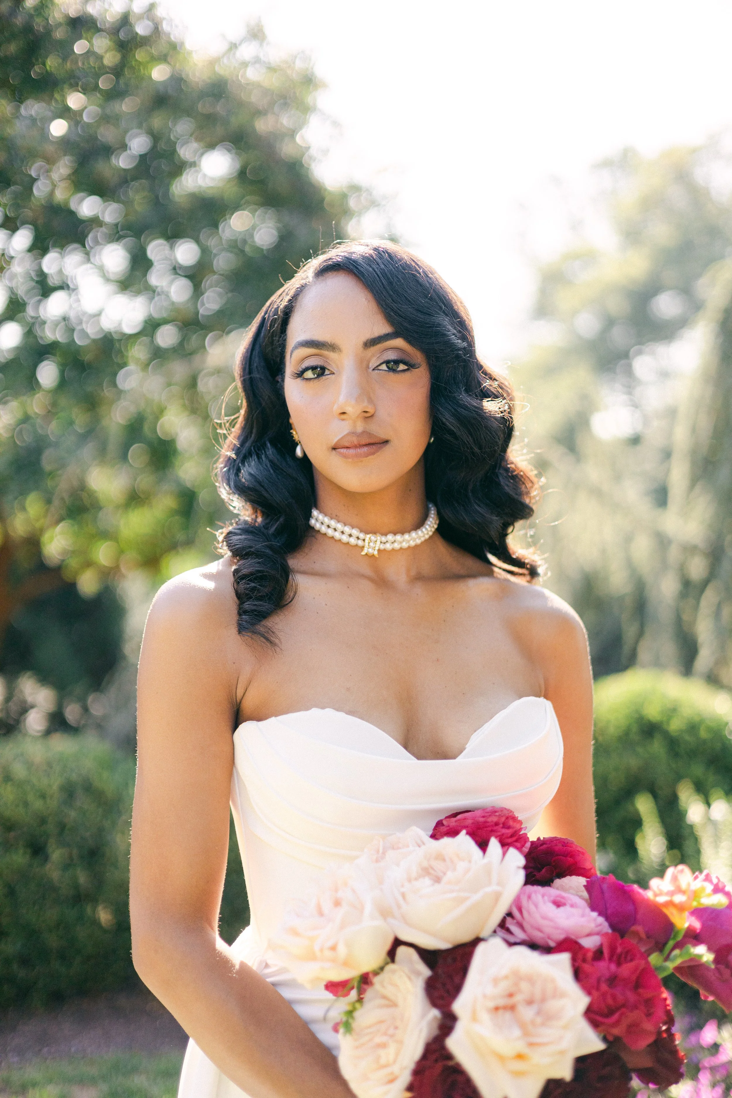 BRIDE HOLDING WEDDING BRIDAL BOUQUET RED PINK