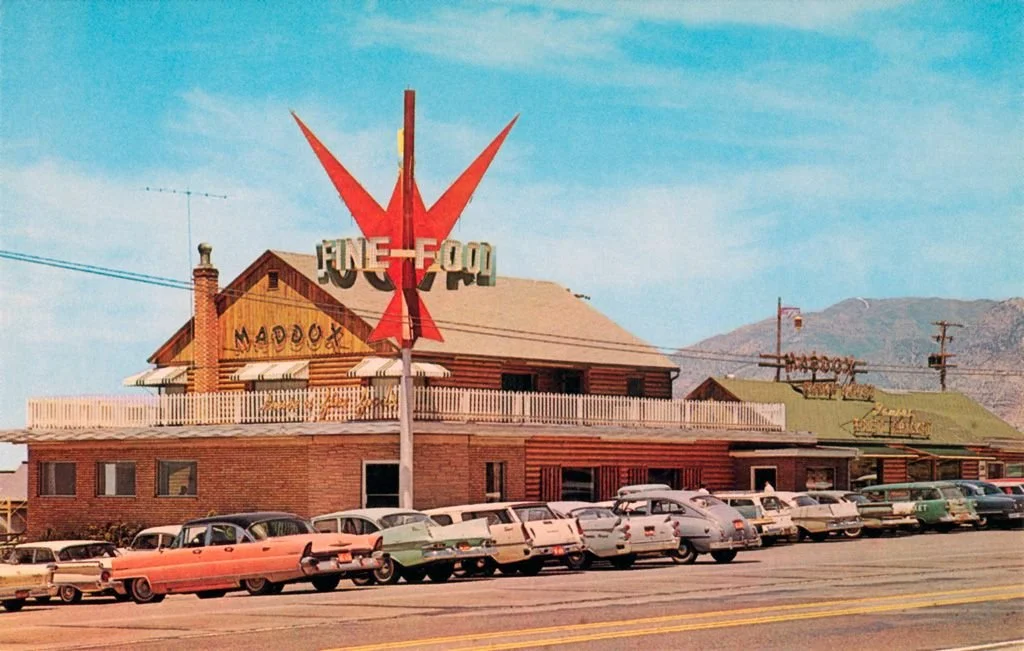 Historic Maddox Fine Food restaurant off Highway 89 in Perry Utah, shown in an old photograph near residential and commercial areas served by asphalt paving, repair, and maintenance services.