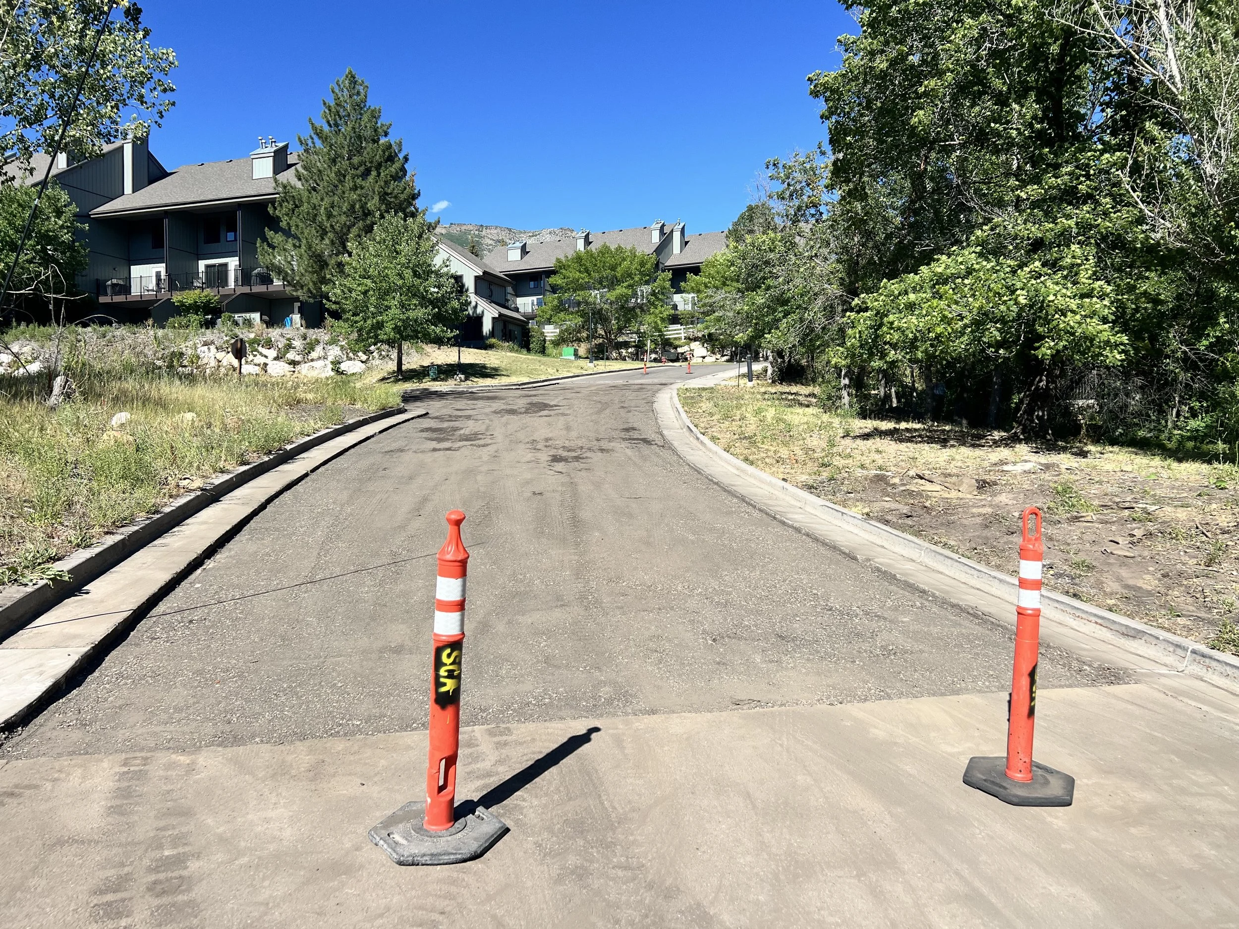 Parking lot maintenance and striping in Northern Utah for commercial properties, HOAs, and multi‑unit housing — licensed B100/E100 contractor providing sealcoating, crack sealing, patching, ADA striping, and high‑visibility markings