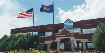West Valley City Hall and surrounding commercial district — representing local asphalt paving, repair, and maintenance services.