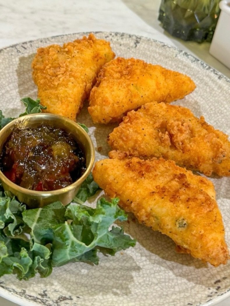 A Sweater Weather menu favorite: Fried Pimento Cheese Grit Points with hot pepper jelly. A Southern classic made even cozier.
