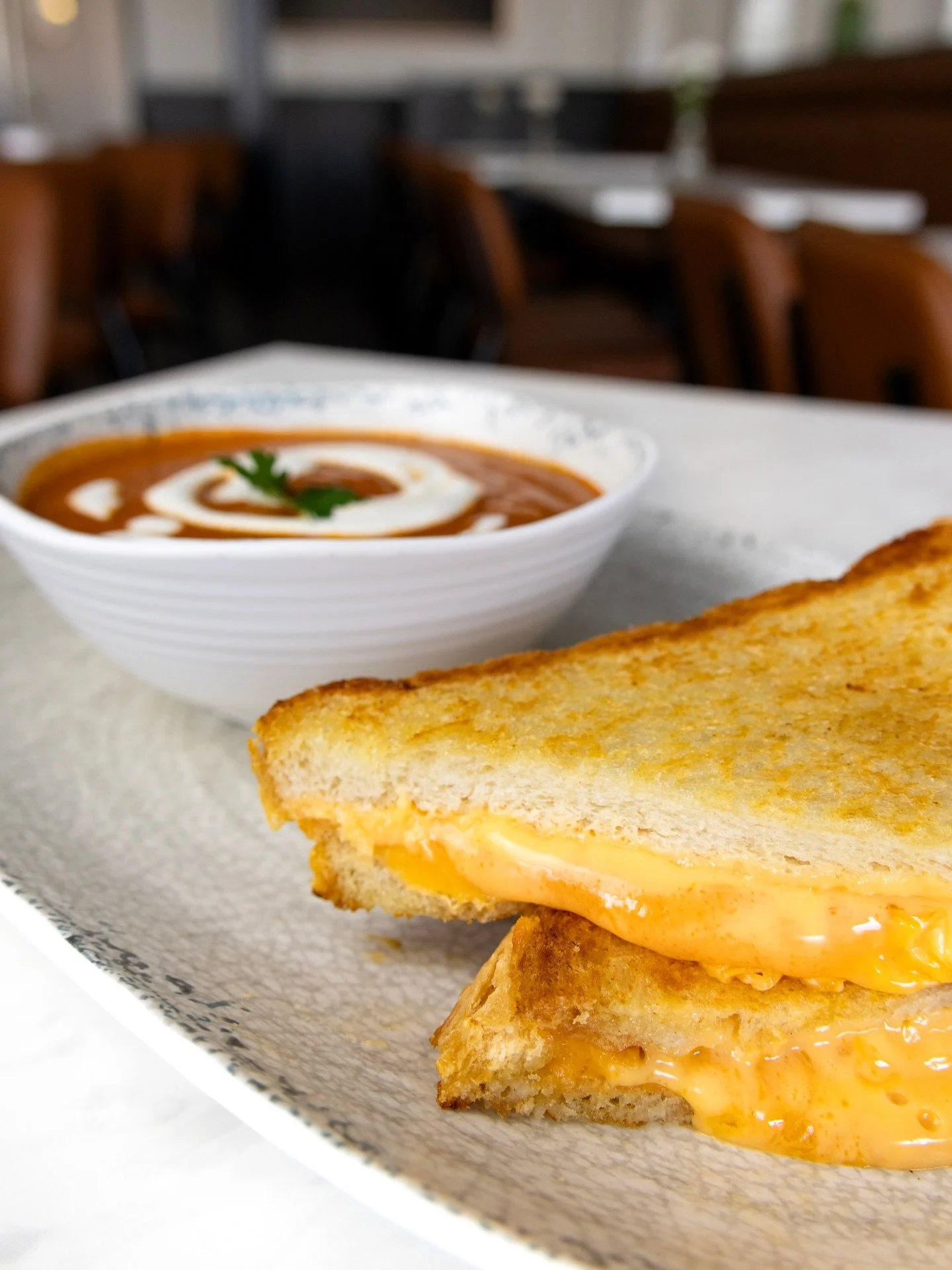 If this isn&rsquo;t grilled cheese and soup weather, we don&rsquo;t know what is. We&rsquo;ve got 3 kinds of grilled cheeses, 2 soups plus bowls of chili on the menu, so you can create a different combo every day this week! 🍲