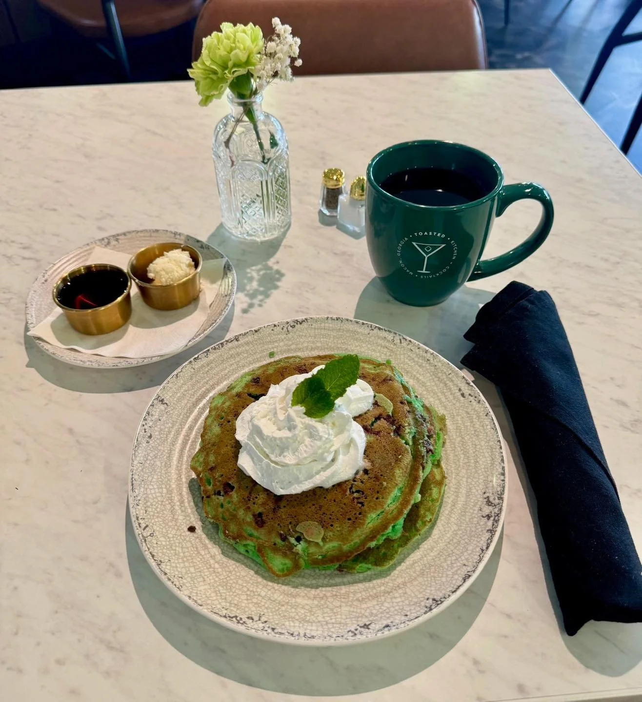 St. Patrick's Day calls for a green breakfast! Mint Chocolate Chip Pancakes are now available on our new spring specials menu. 🍀