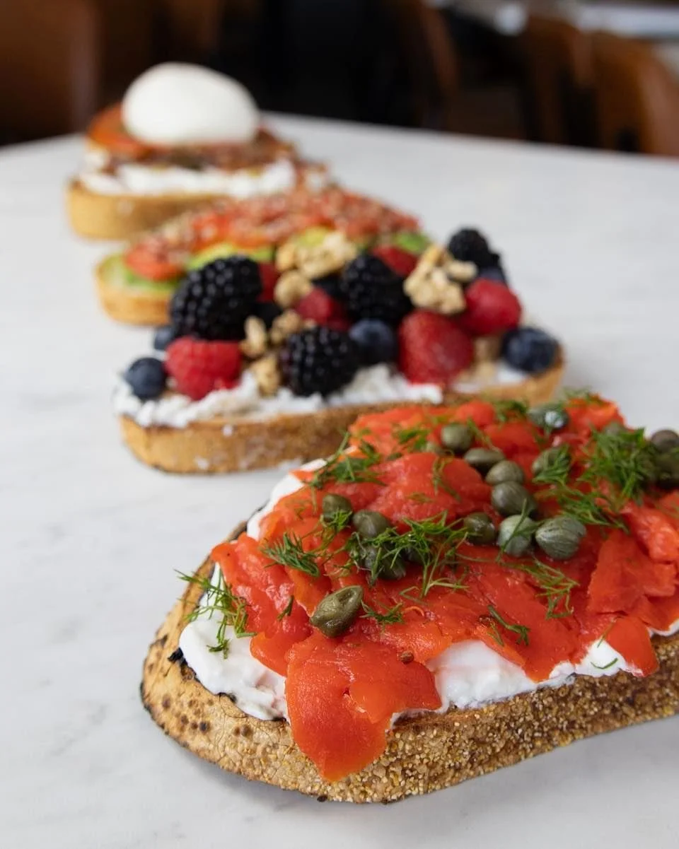 Toast first... then meetings. We open at 7am every day. Stop in before work or get it delivered straight to your desk! 🥑