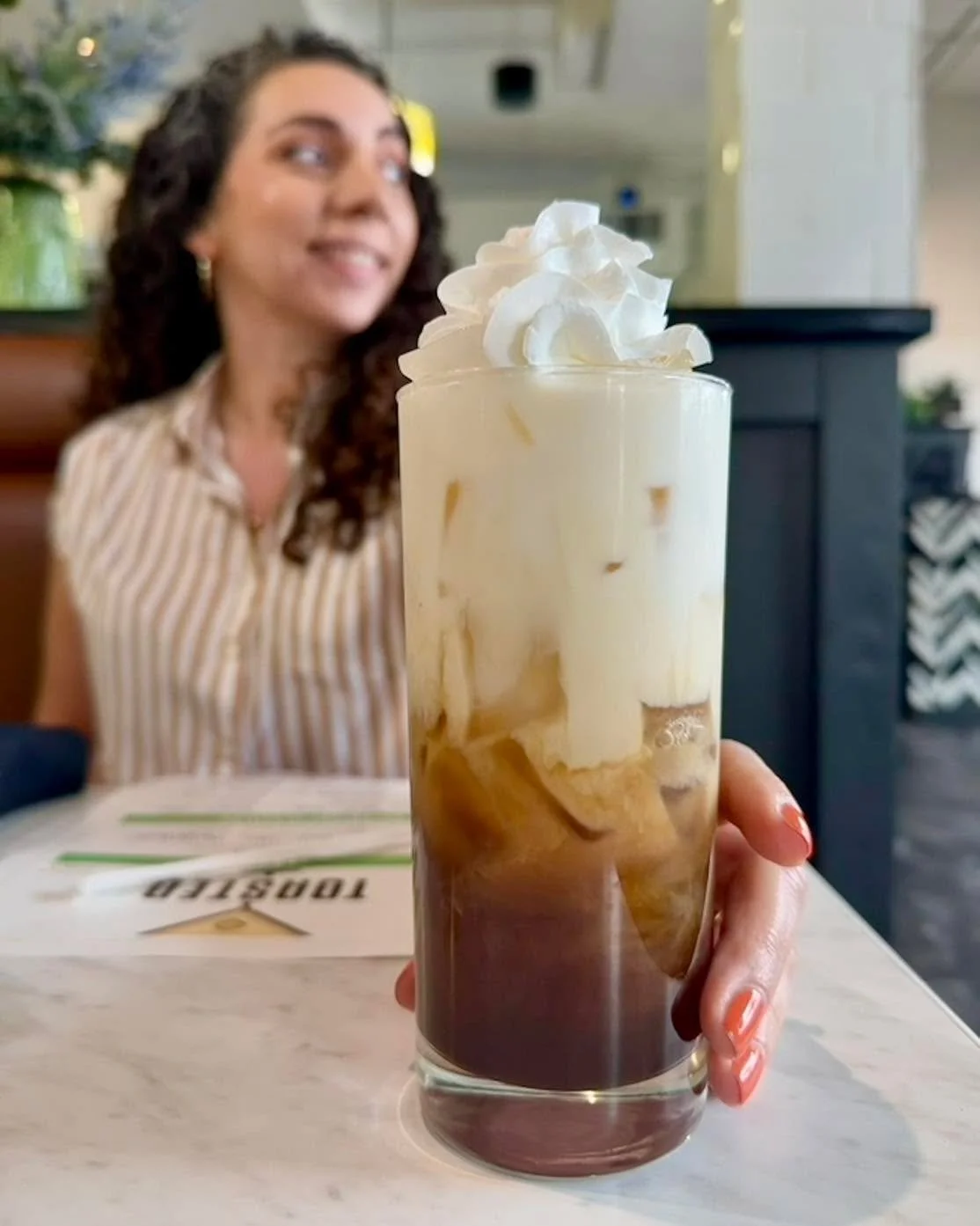 Smiles + extra whipped cream because we're almost to Friday. Grab a coffee with us on the way to work!
