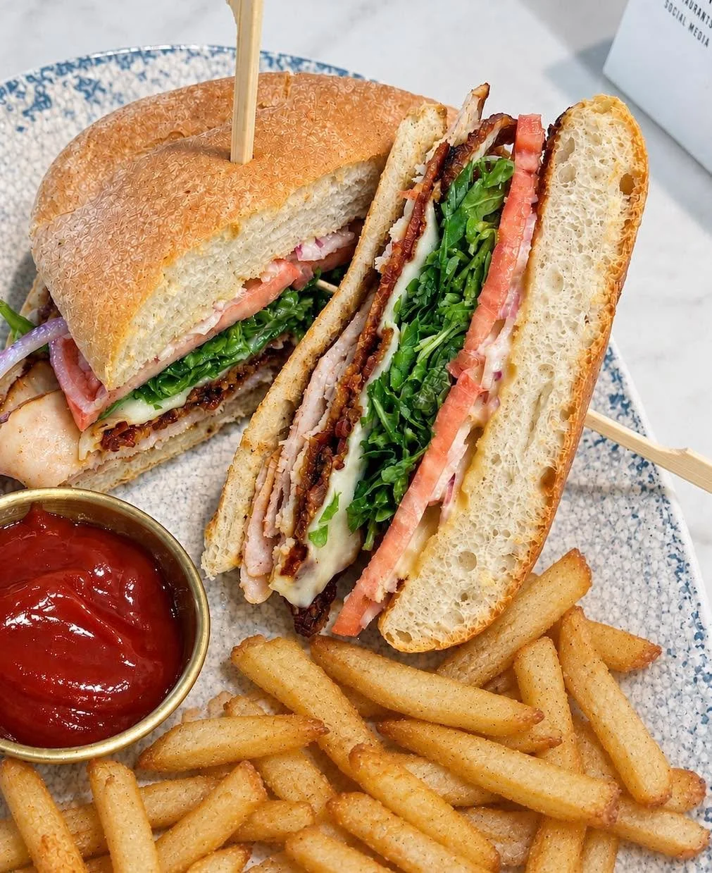 Nothing says fall like our new Toasted Turkey Sandwich. Served with ooey gooey melted muenster, tomato, onion, Granny Smith apples, crispy bacon, arugula + sweet spread on ciabatta.