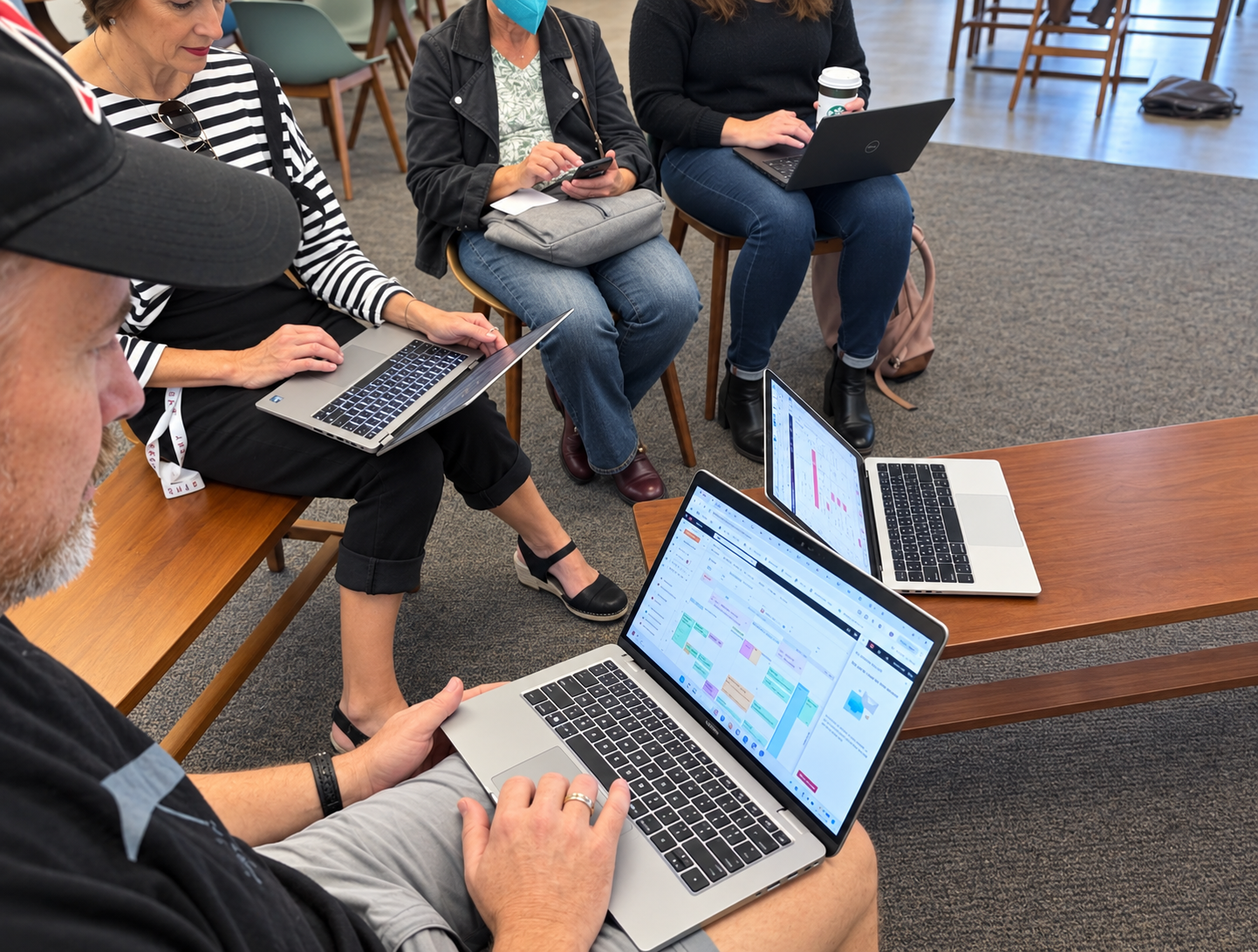 A group of people exploring new software