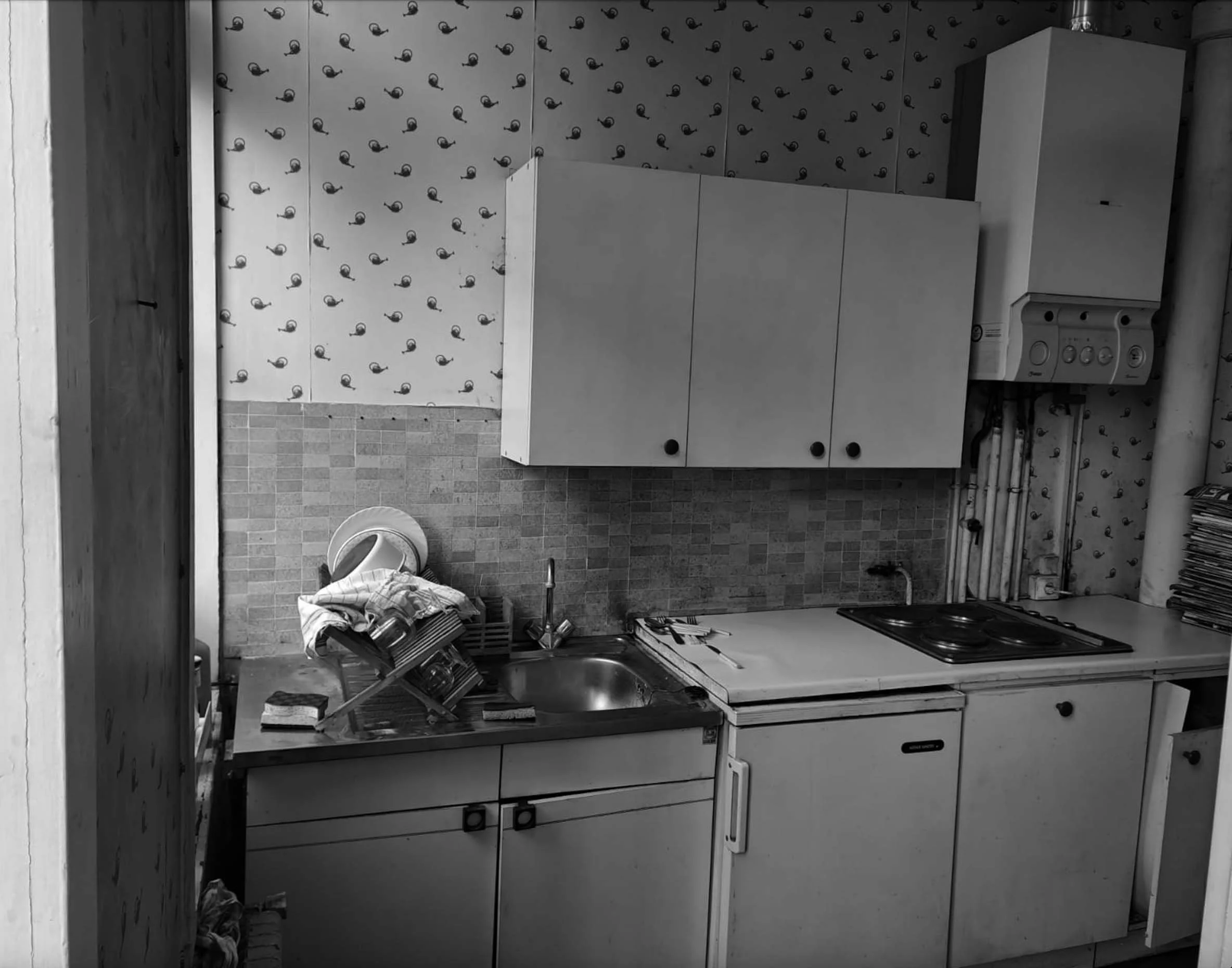 Vue de l'ancienne cuisine. Le réseau de gaz a été supprimé.