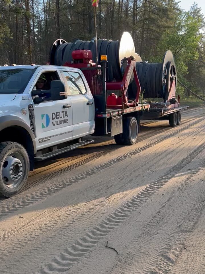 Delta Wildfire is currently supporting SPSA with structure protection in the Holbein community.

Perimeter sprinkler line is in place to raise the humidity and additional hose and sprinklers ready to set up to protect each home.

Thank you for the su