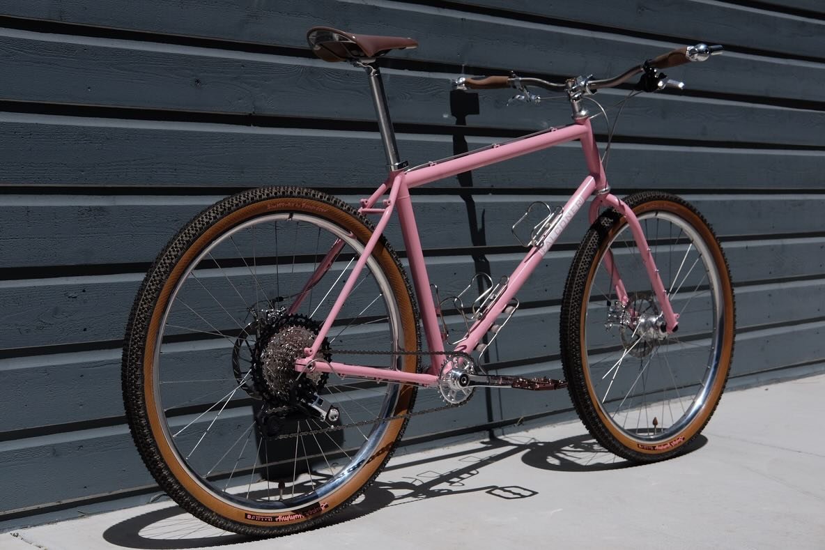 @coffeeandeggs made me a pink bike. I&rsquo;m very very excited about it. Lots of 🇺🇸 made parts and functionality for some upcoming bike touring. Front and rear racks in progress that will be painted to match. Dynamo lights will keep me rolling in 