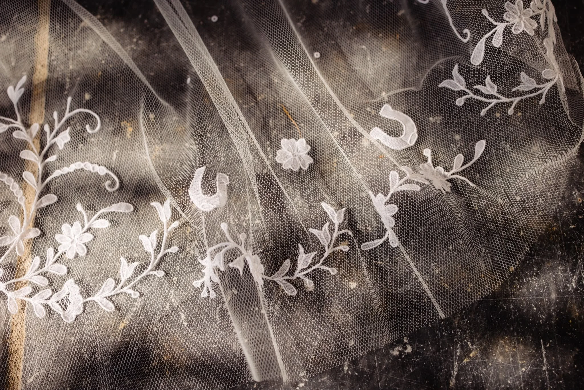 Custom Carrickmacross Irish lace wedding veil with personalised floral and horse shoe motifs