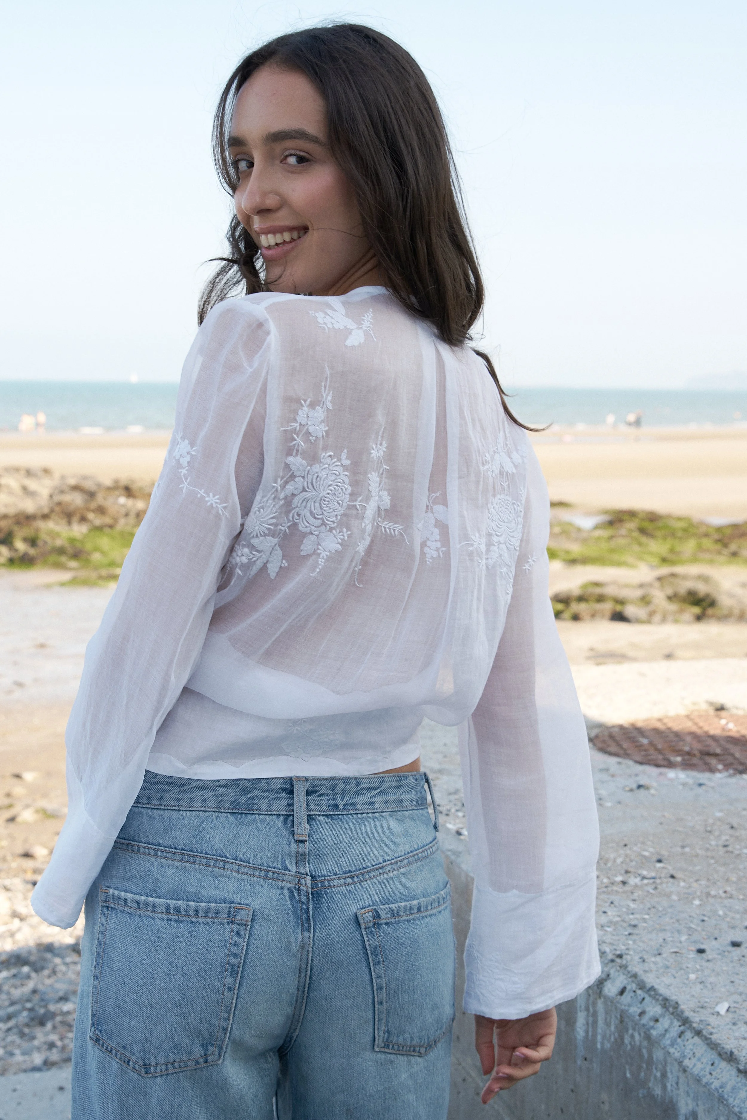 Hand embroidered flowers on cotton voile women's shirt
