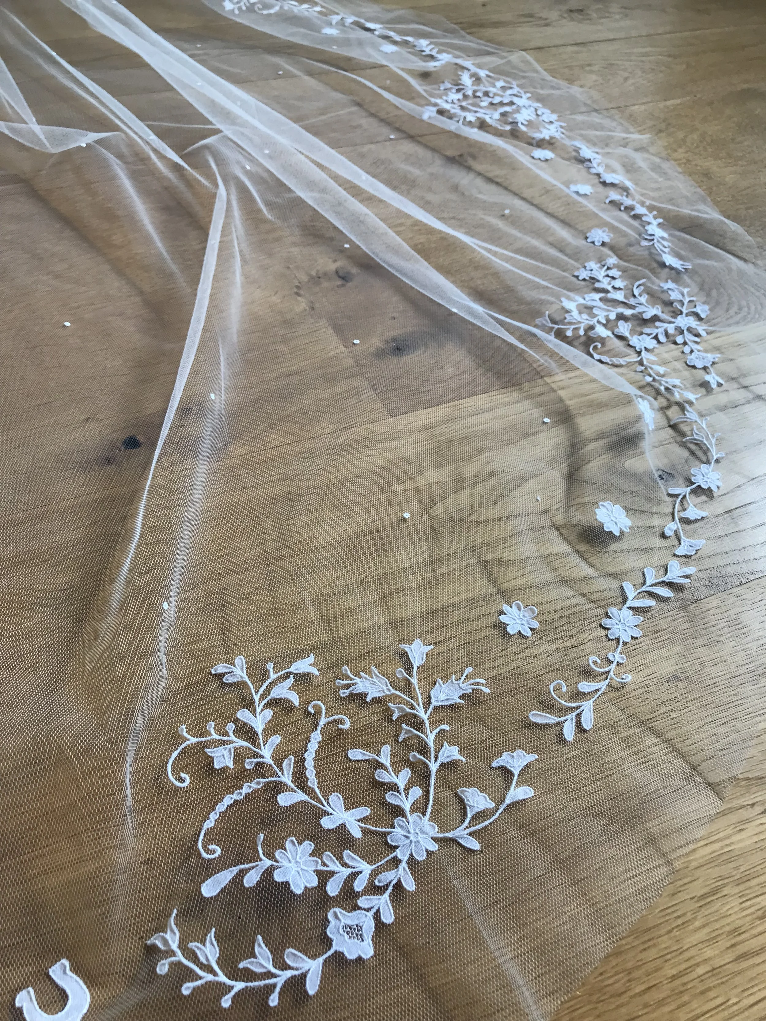 Bespoke Carrickmacross Irish lace wedding veil with personalised wild flower design