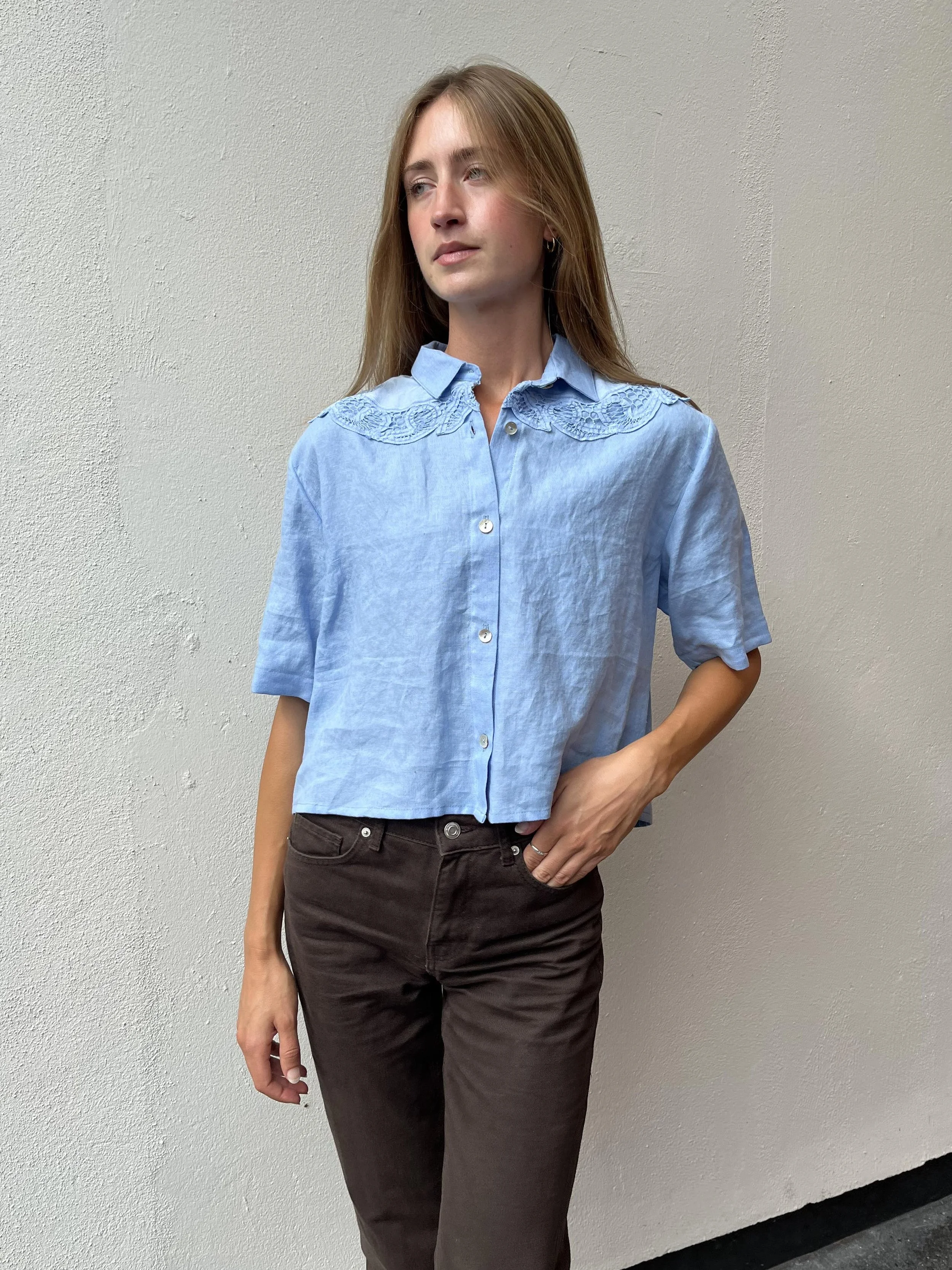 Cornflower blue Irish linen cropped shirt with vintage lace at shoulders and shell buttons