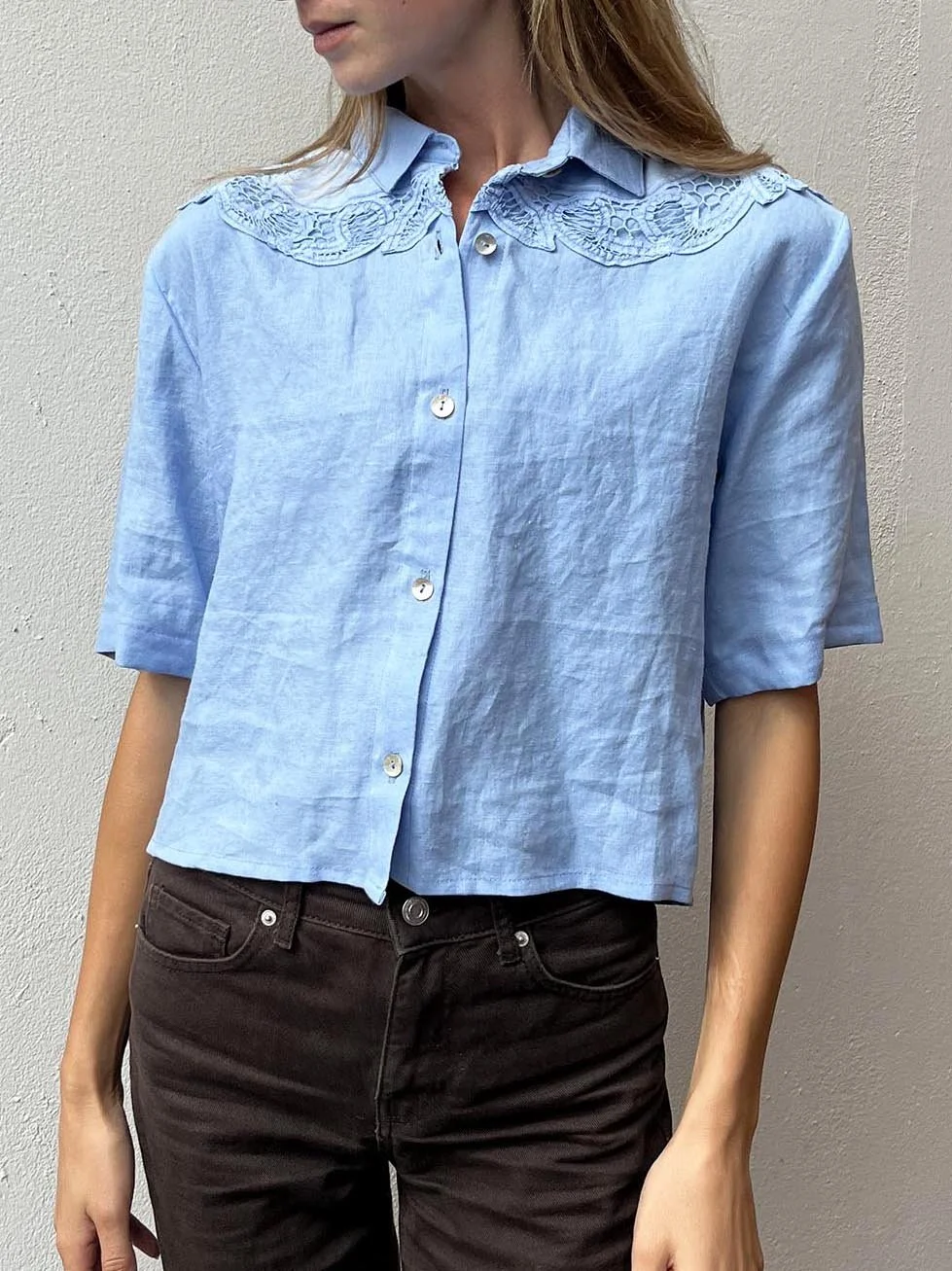 Cornflower blue Irish linen cropped shirt with vintage lace at shoulders and shell buttons
