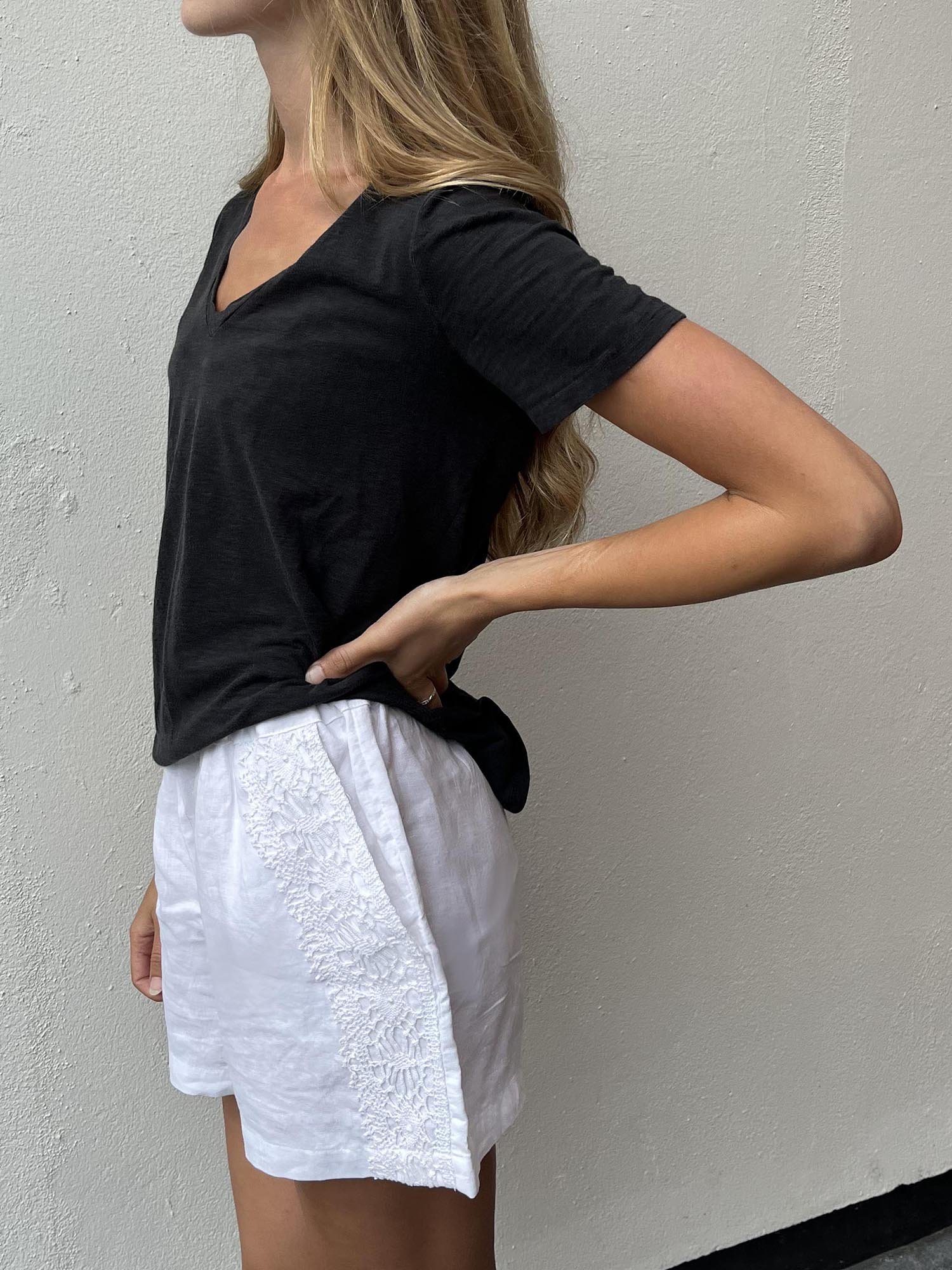 White Irish linen shorts with pockets and vintage crochet lace