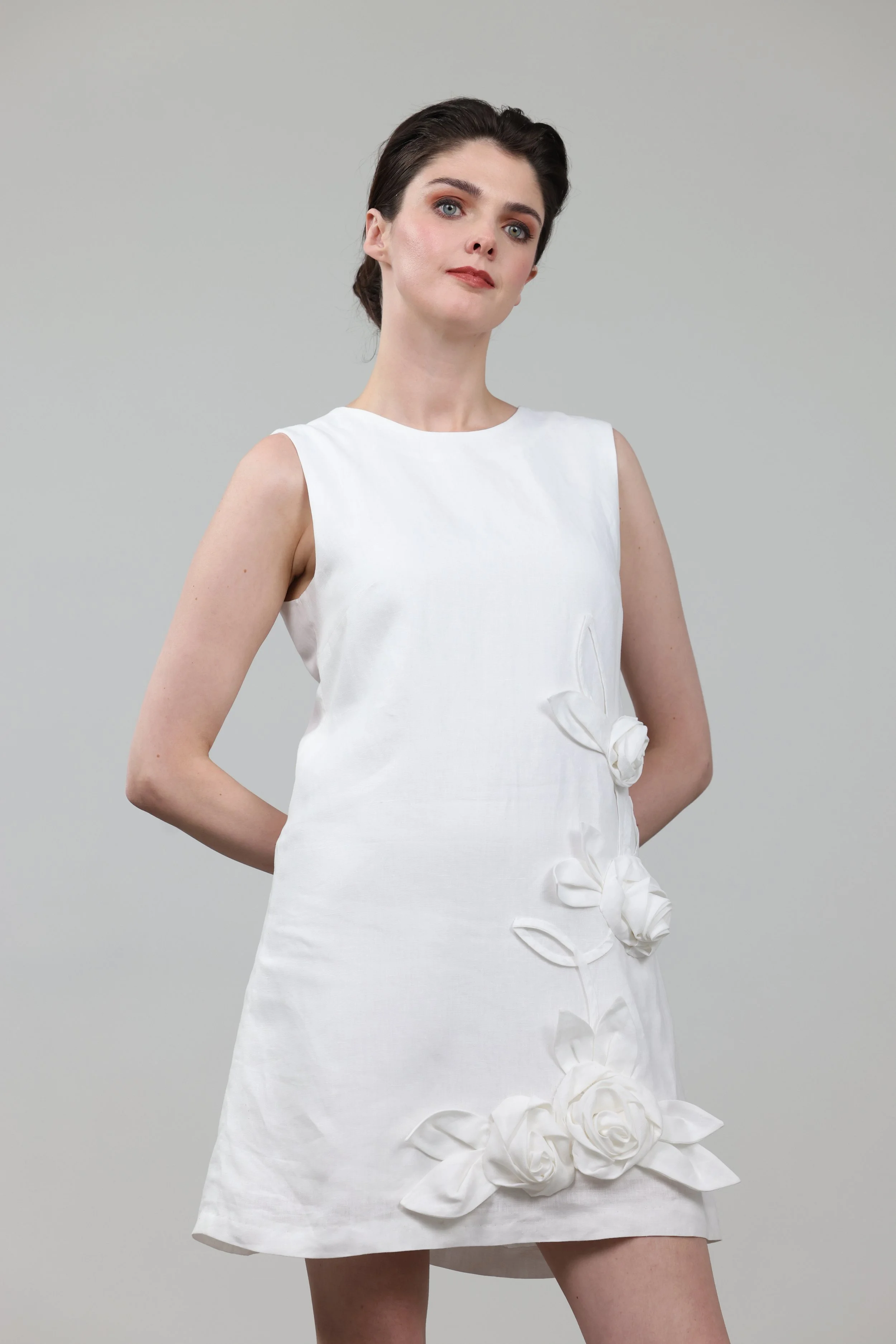 White Irish linen shift dress with linen flower embellishment and Lenzing ecovero satin lining