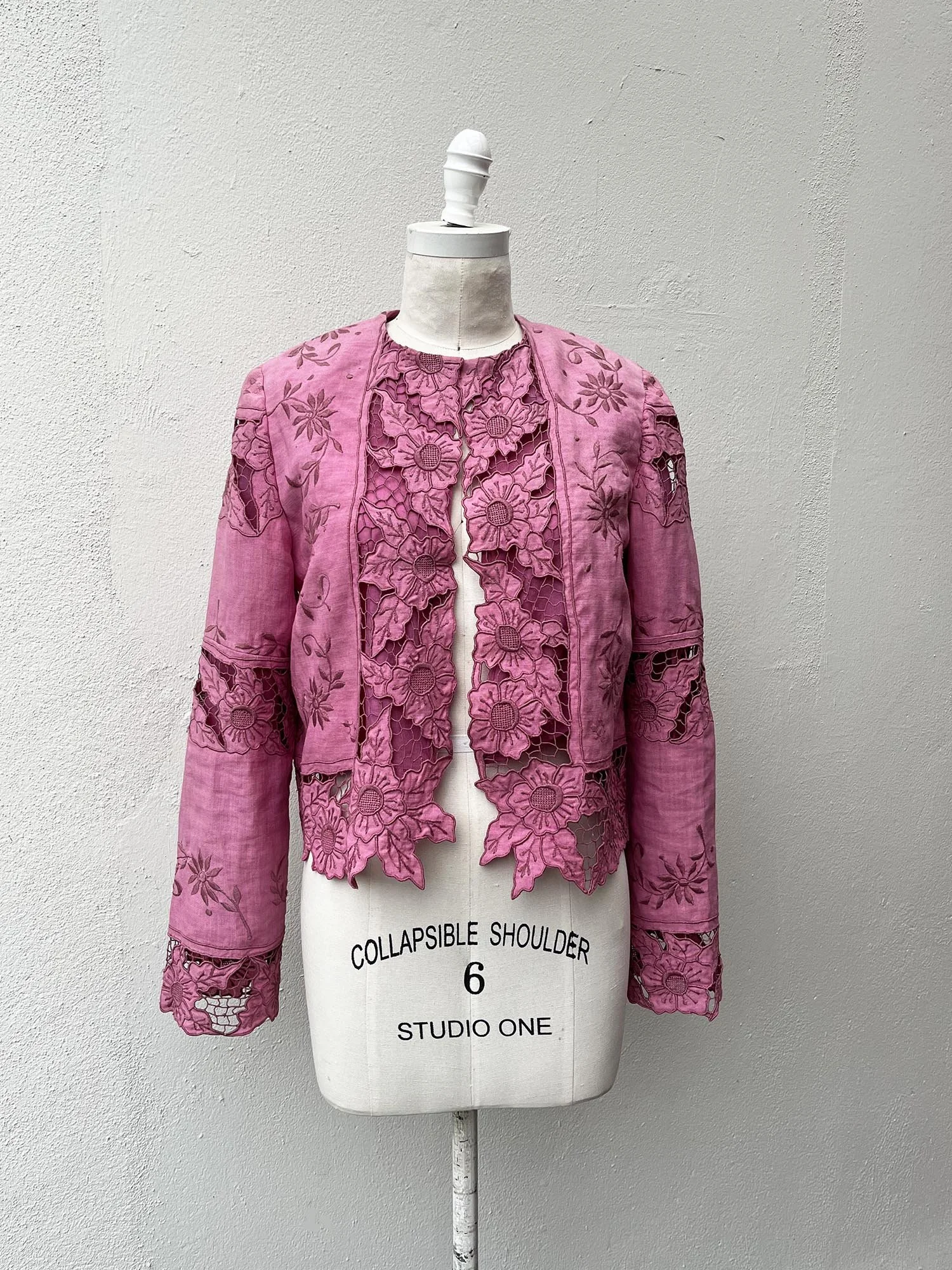 Pink cropped women’s jacket up-cycled from an antique embroidered linen, cutwork tablecloth