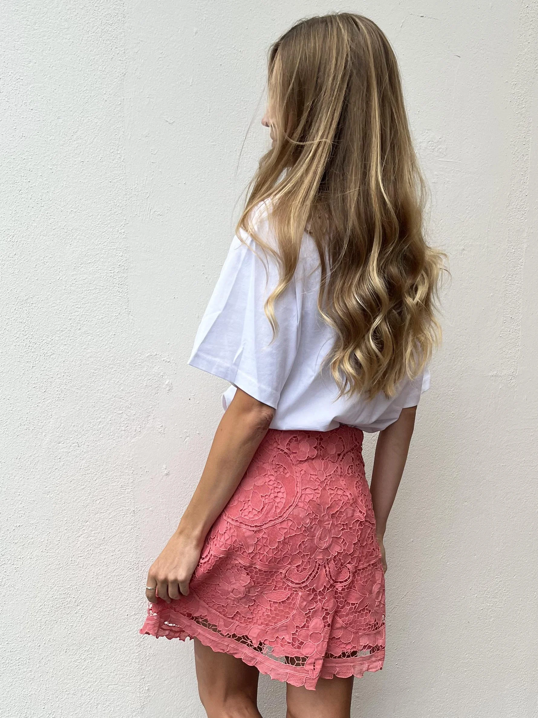 Coral coloured A-line mini skirt, up-cycled from antique Madeira cutwork lace