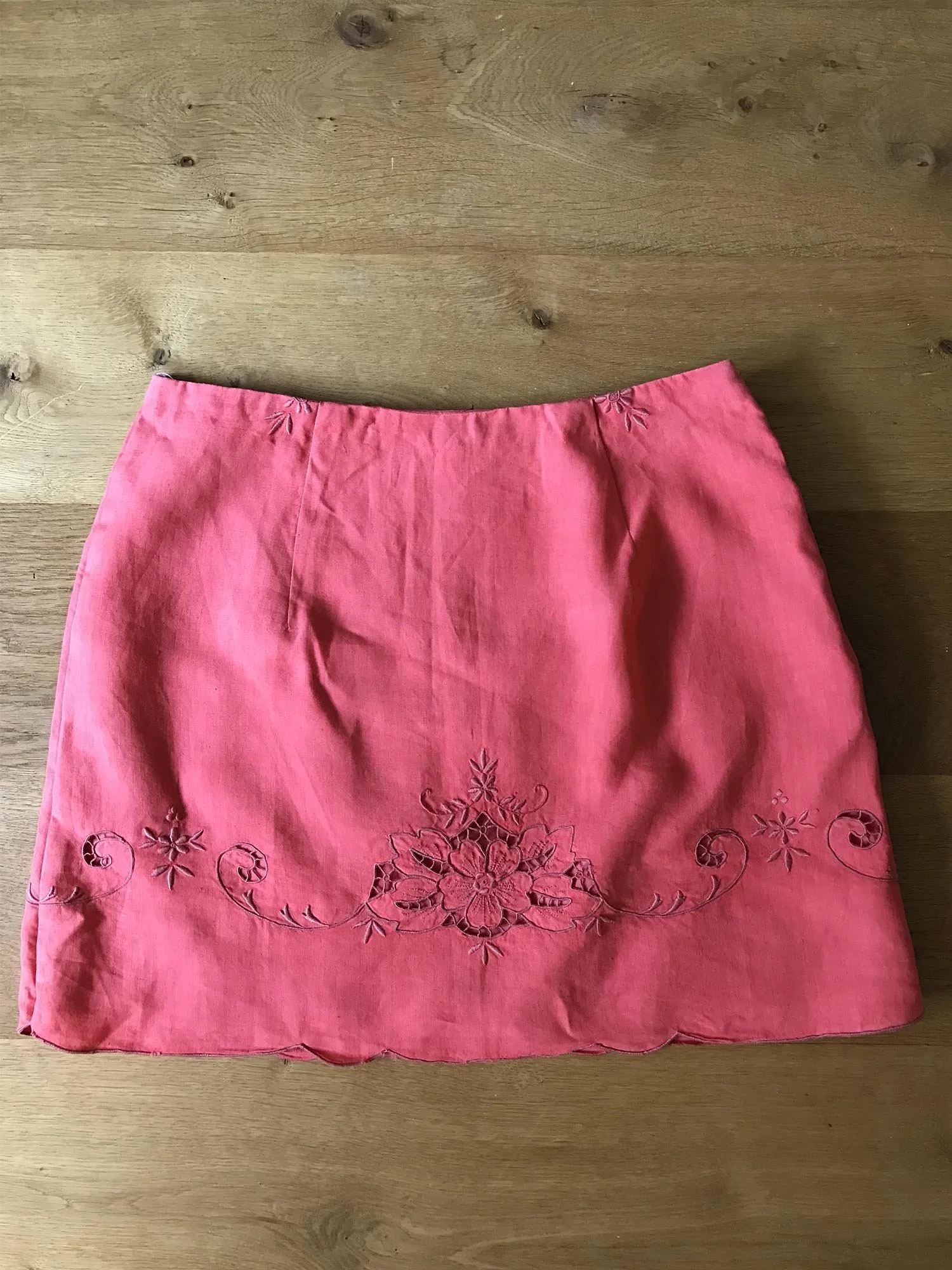 Coral coloured A-line skirt, up-cycled from an antique, embroidered, cutwork lace tablecloth