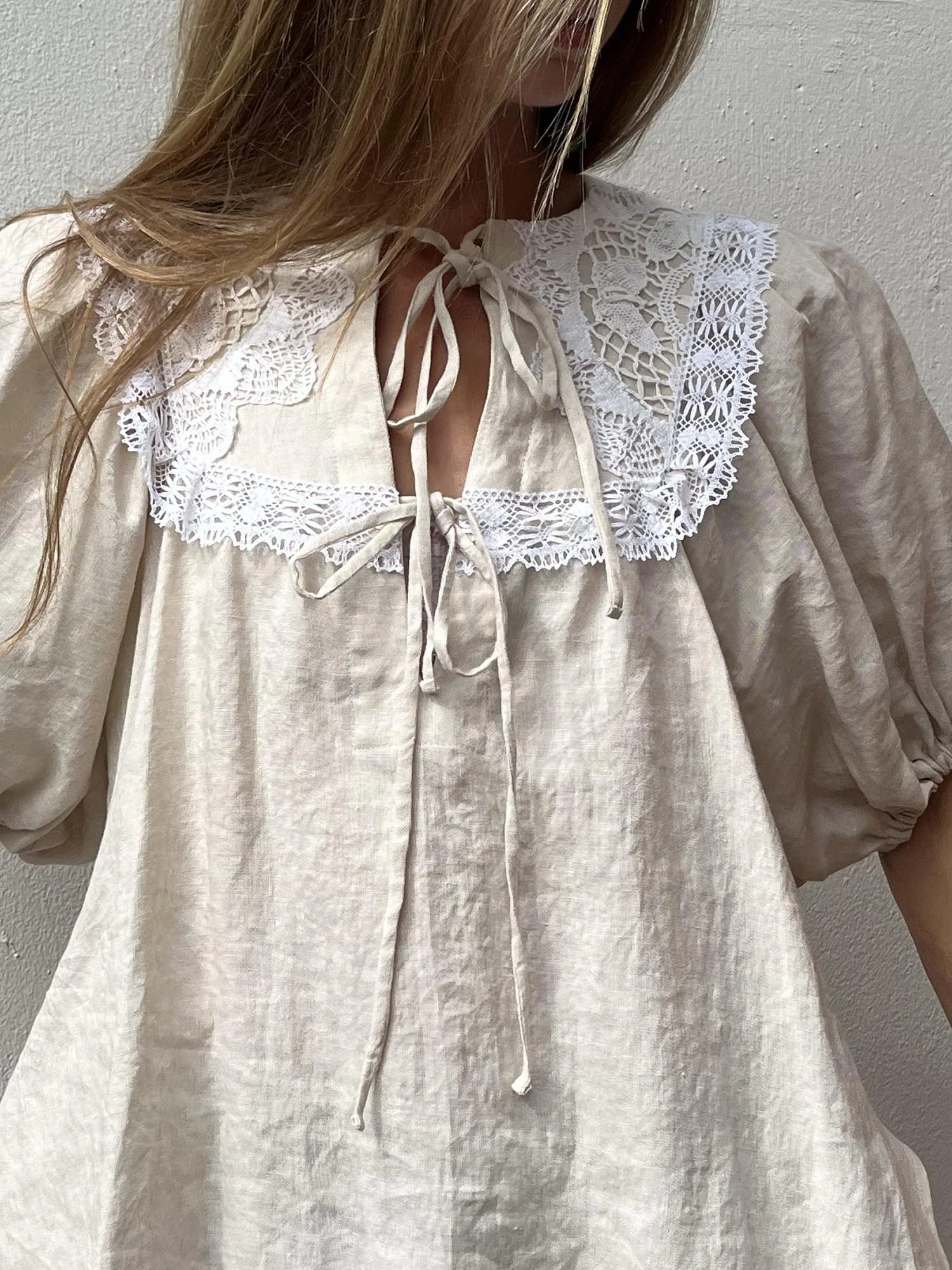 Oatmeal coloured Irish linen, puff sleeve blouse with ties at front and handmade crochet lace at neckline