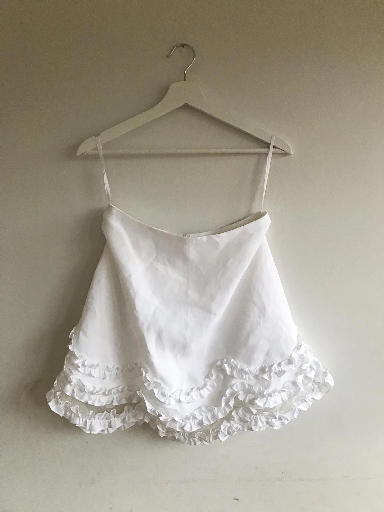 White Irish linen A-line mini skirt with three frills at hem