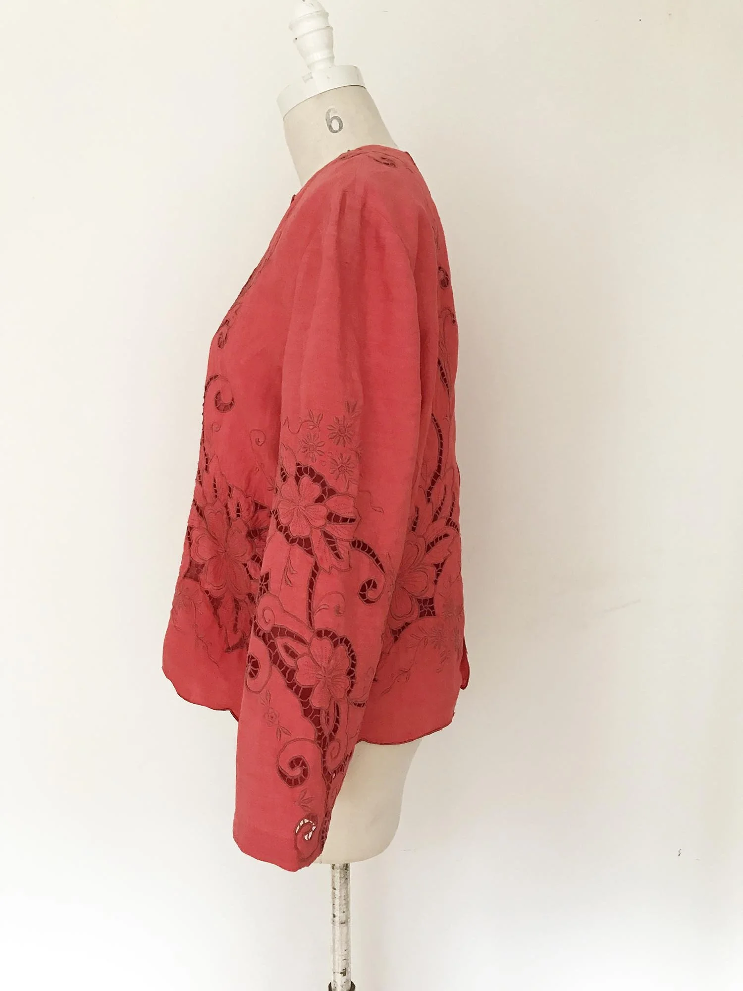 Coral coloured cotton women’s jacket, up-cycled from an antique, embroidered, cutwork tablecloth