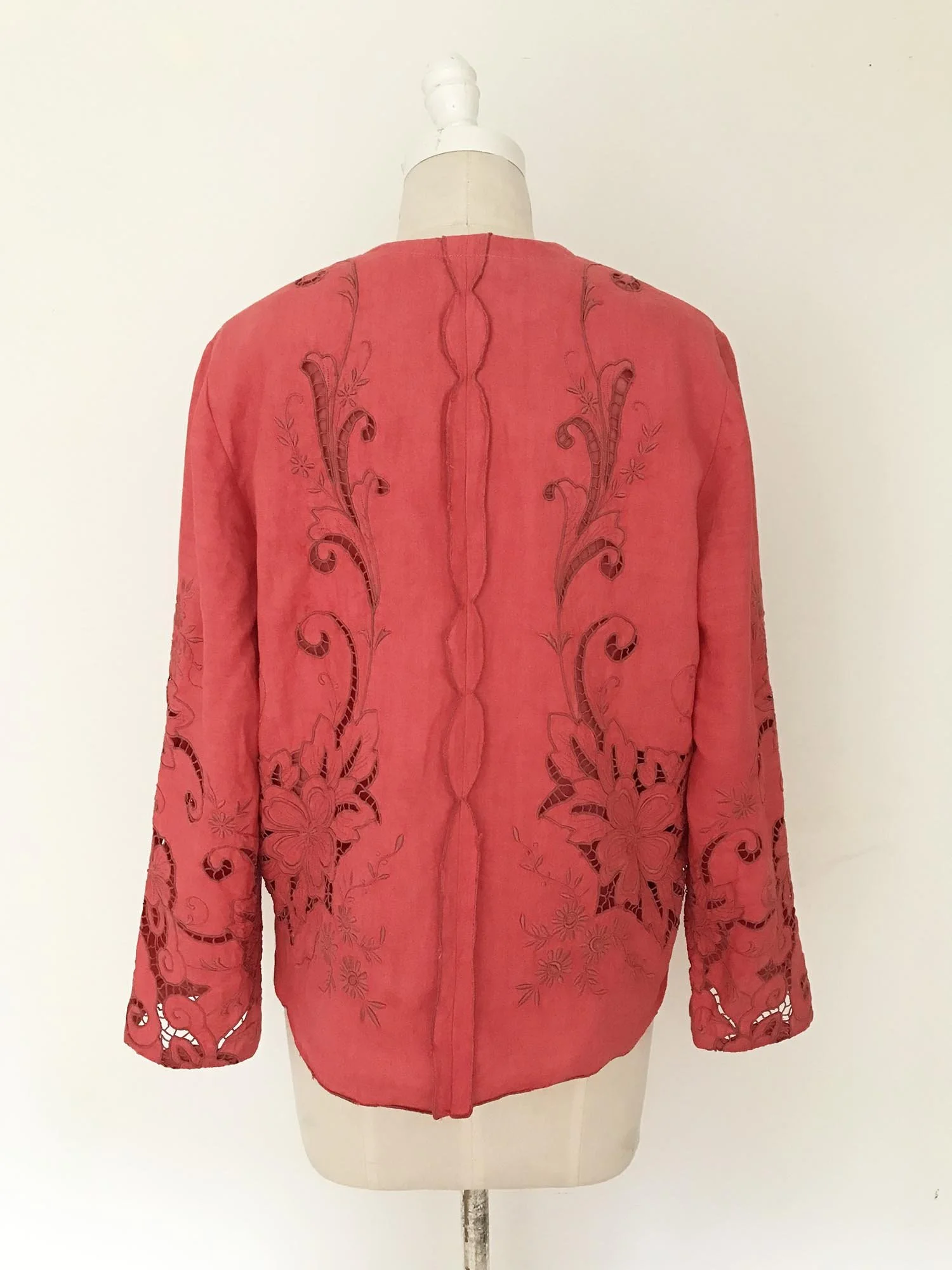 Coral coloured cotton women’s jacket, up-cycled from an antique, embroidered, cutwork tablecloth