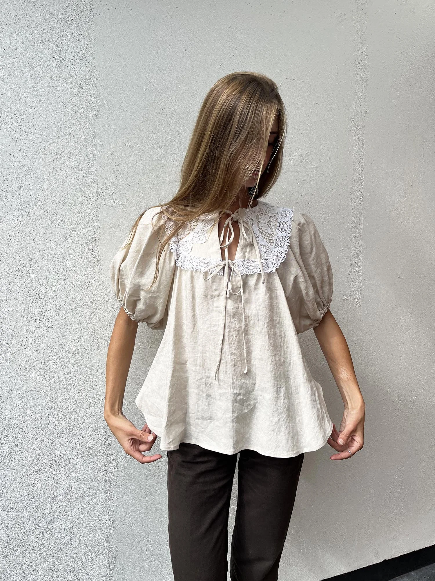 Oatmeal coloured Irish linen, puff sleeve blouse with ties at front and handmade crochet lace at neckline