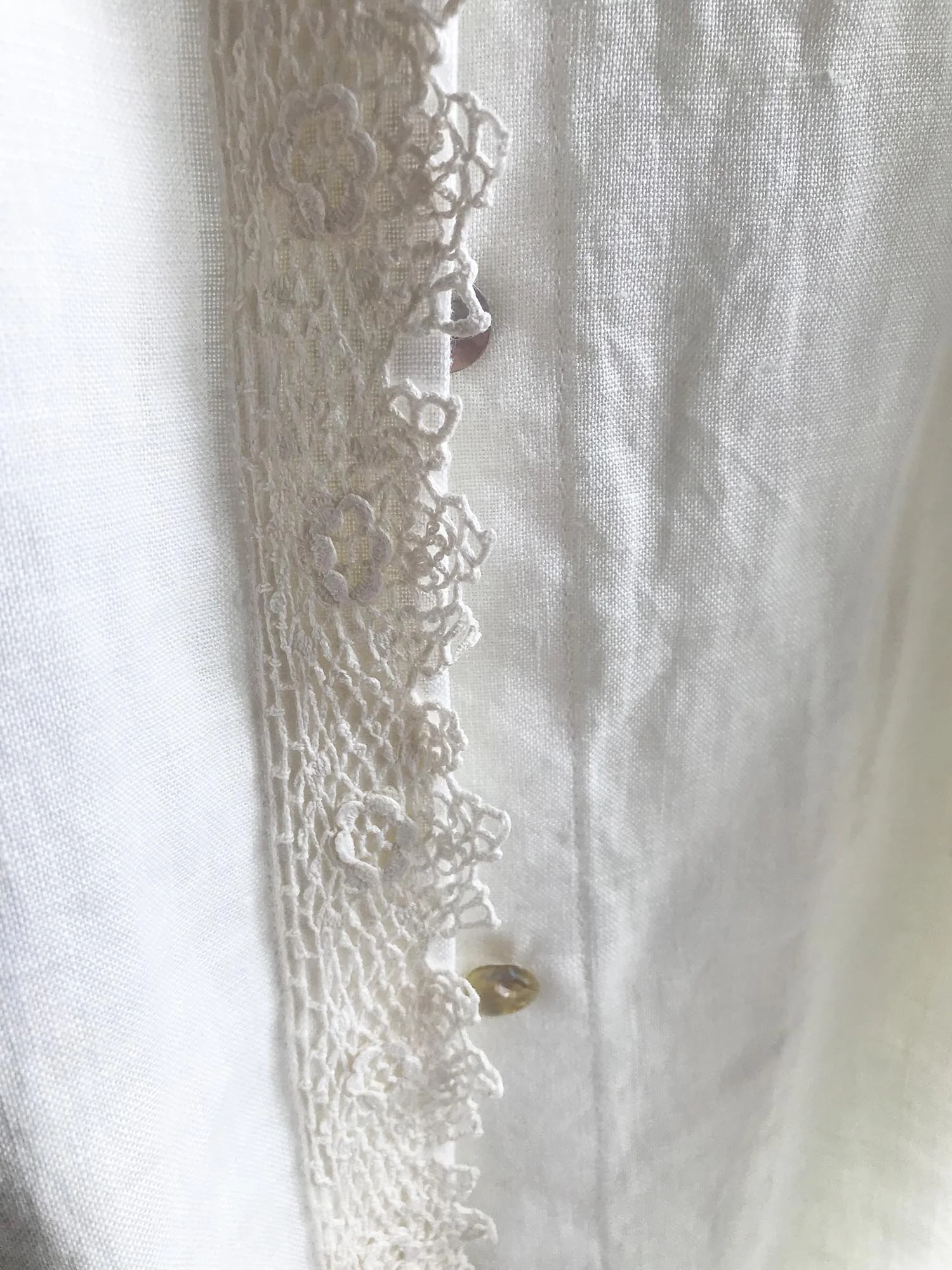 Ivory long sleeved shirt made from Irish linen, with handmade, antique crochet Irish lace at front