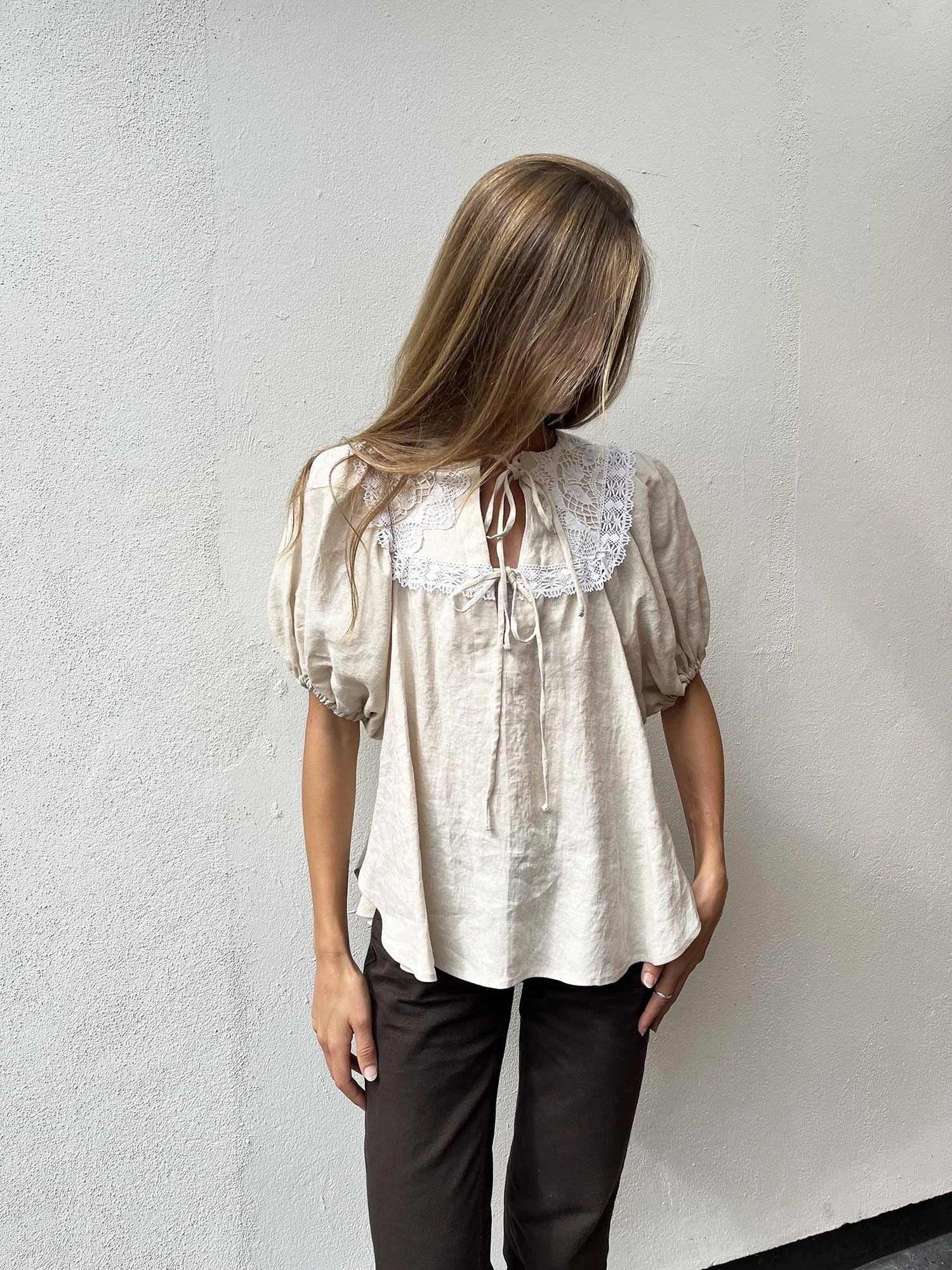 Oatmeal coloured Irish linen, puff sleeve blouse with ties at front and handmade crochet lace at neckline
