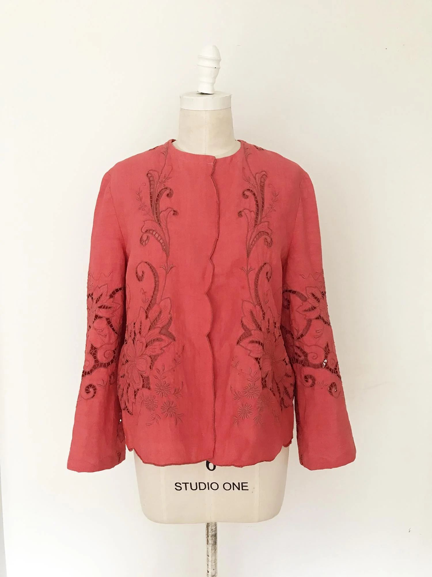 Coral coloured cotton women’s jacket, up-cycled from an antique, embroidered, cutwork tablecloth