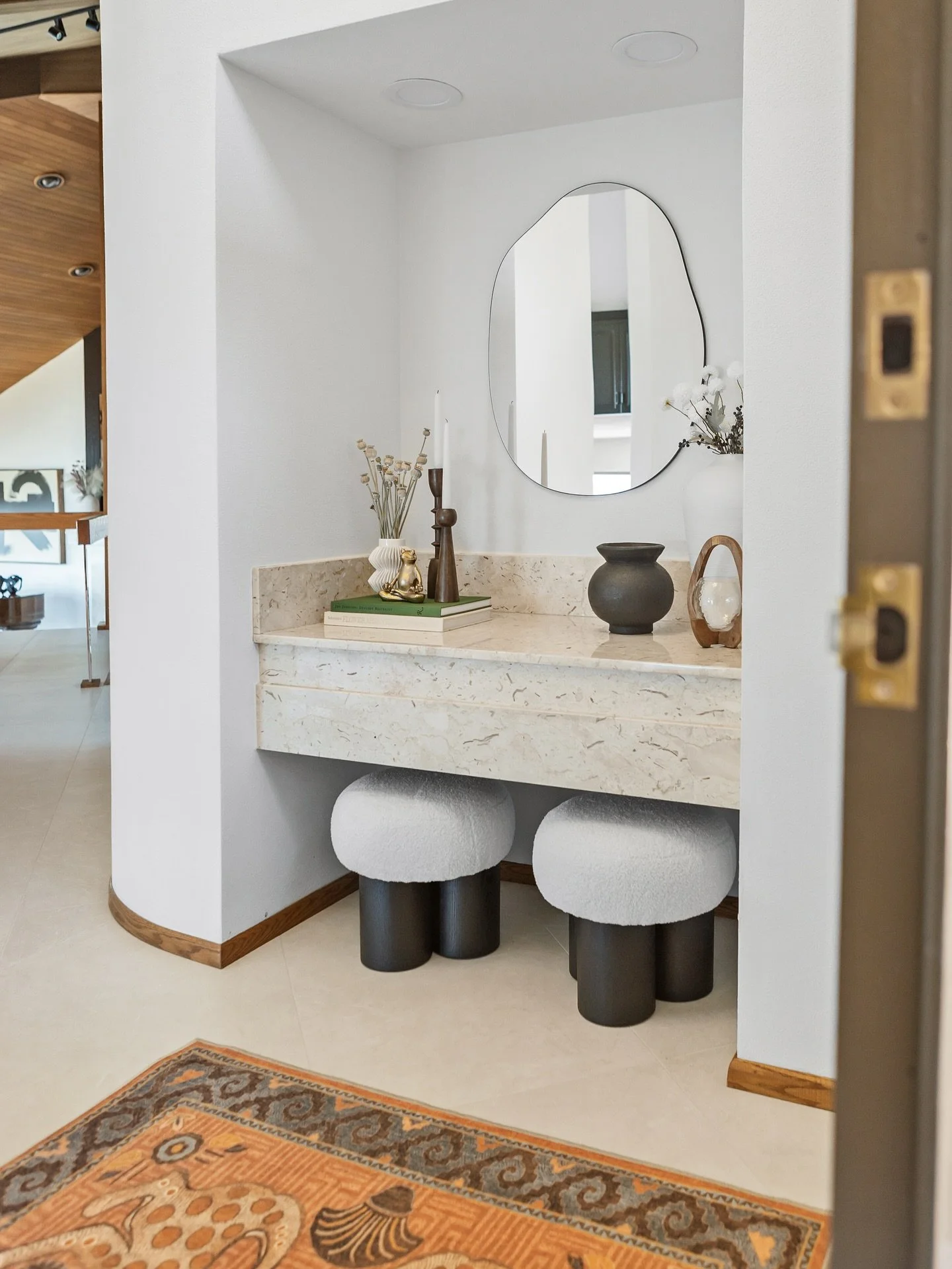 &bull; First Impressions Matter &mdash;&mdash; Your entryway sets the tone for your entire home &mdash; and this one does it with quiet confidence and spunk! 😜 From the custom travertine console to the sculptural stools, the fun @ruggable and curate