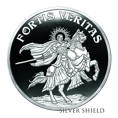 A silver coin featuring a knight on a horse with a sword, with rays around the knight's head, and the Latin phrase 'Fortis Veritas' at the top and 'Silver Shield' at the bottom.