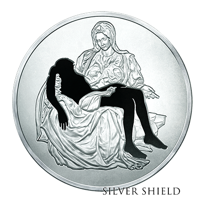 A silver coin featuring an embossed depiction of a woman sitting with her legs crossed, with another woman lying down and resting her head on her lap, overlaid with the text 'SILVER SHIELD' at the bottom.