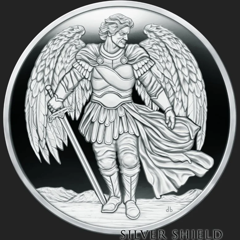 A detailed silver coin featuring a winged warrior with armor, a sword, and a flowing cape against a mountainous background.