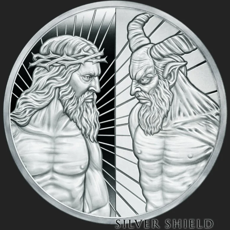 A silver coin featuring a depiction of Jesus Christ and a devil, facing each other separated by lines, with the text 'SILVER SHIELD' at the bottom.