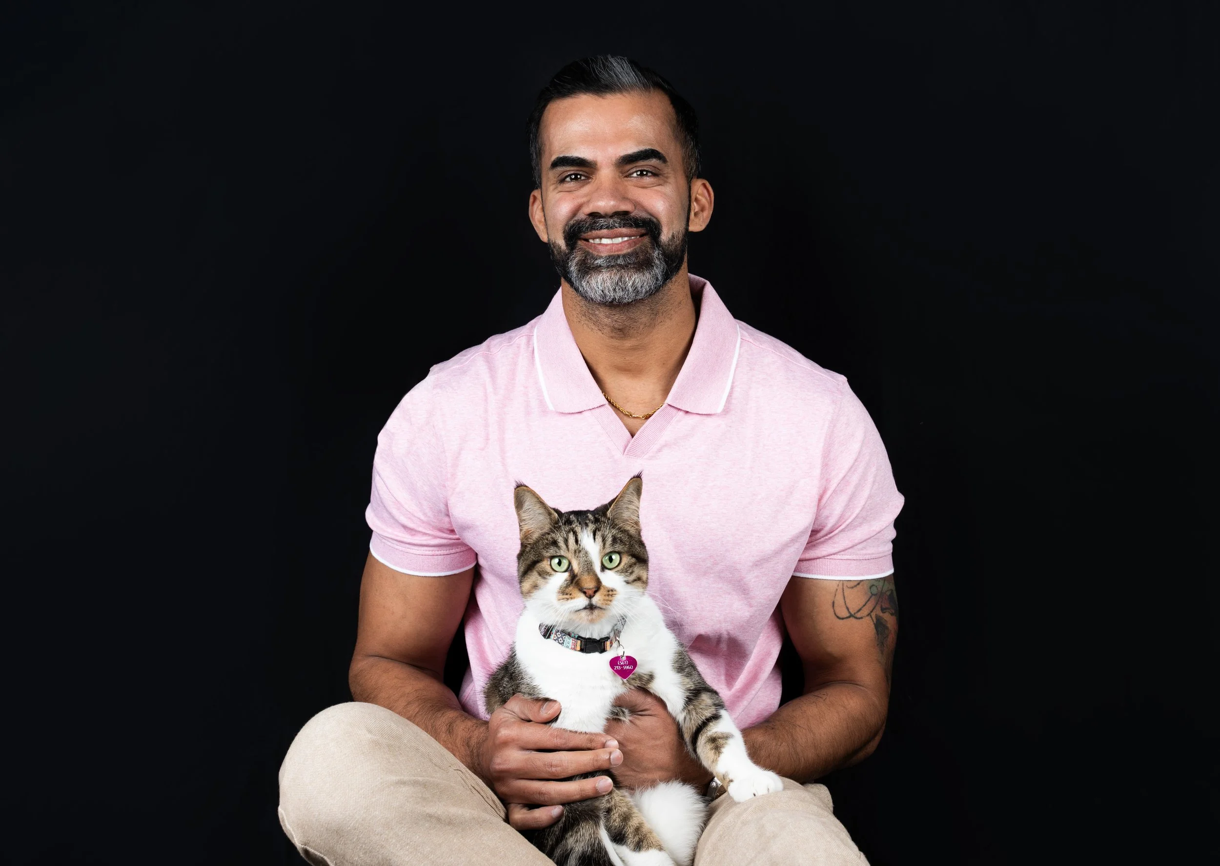 cat-dad-photoshoot-studio-black-background.jpg