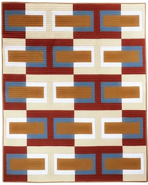 Urbe is a modern quilt pattern with a fresh take on the log cabin block. Designed for confident beginners, it includes clear instructions and versatile color options.
