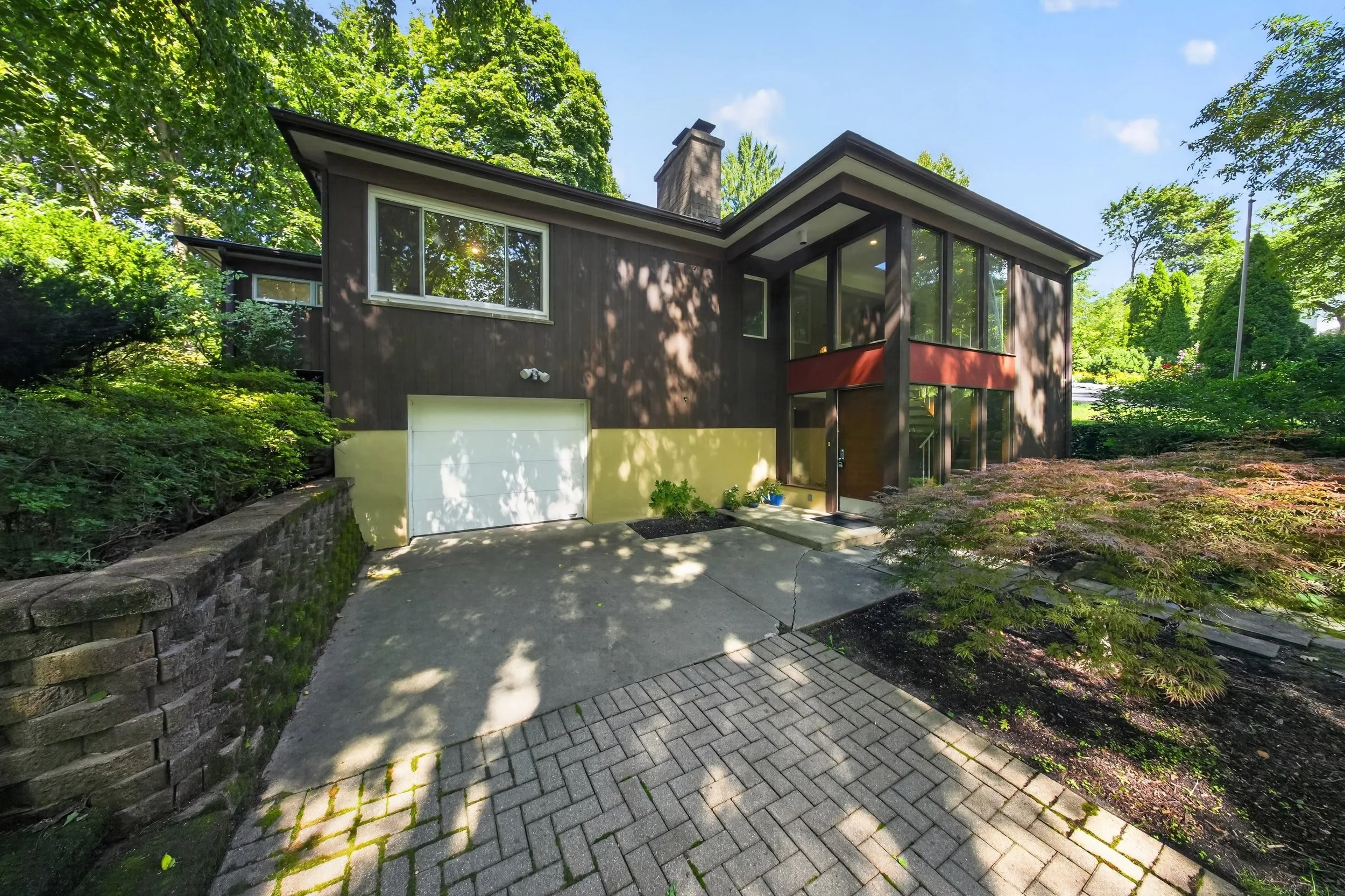 This mid century modern Ann Arbor Hills house has been owned and loved by the same family for over 6 decades. 

But now, it&rsquo;s ready for a new family to call it home.

From huge windows, beautiful hardwood, and a lush green tree-filled lot, ther