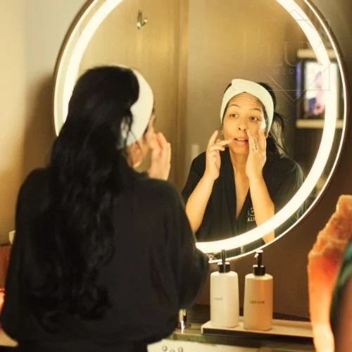 Client smiling after a facial experience at Lux MedSpa Brickell in Miami