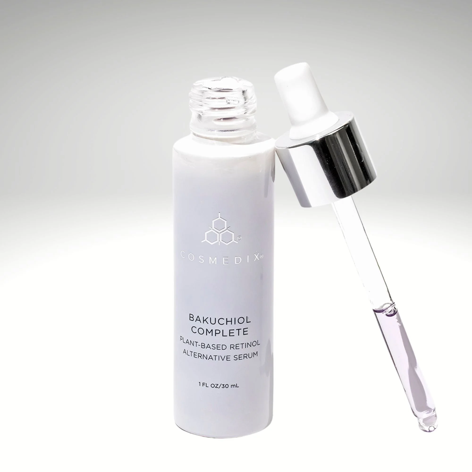 Open COSMEDIX Bakuchiol Complete bottle with a glass dropper