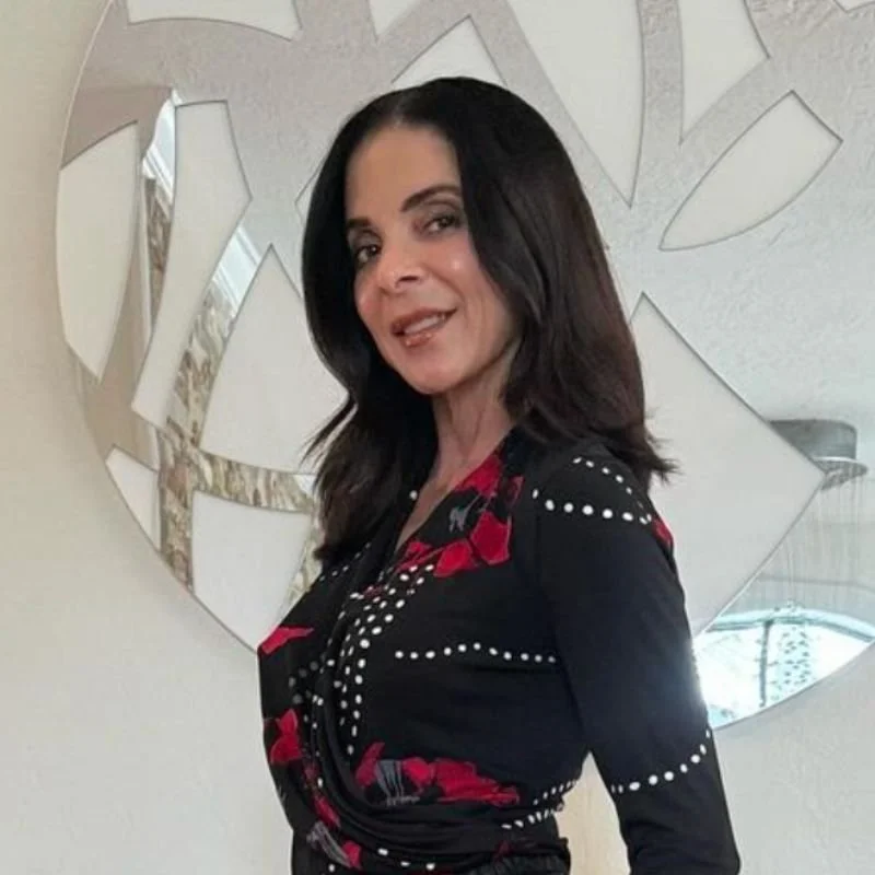 Lux MedSpa Brickell guest smiling after her facial treatment.