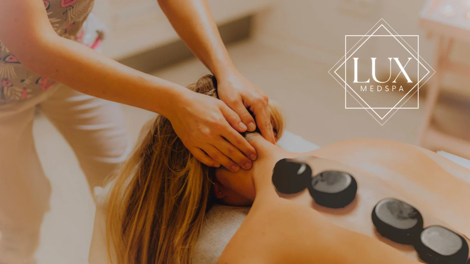 Deep Tissue Massage with scalp massage and hot stones at Lux MedSpa Brickell, Miami