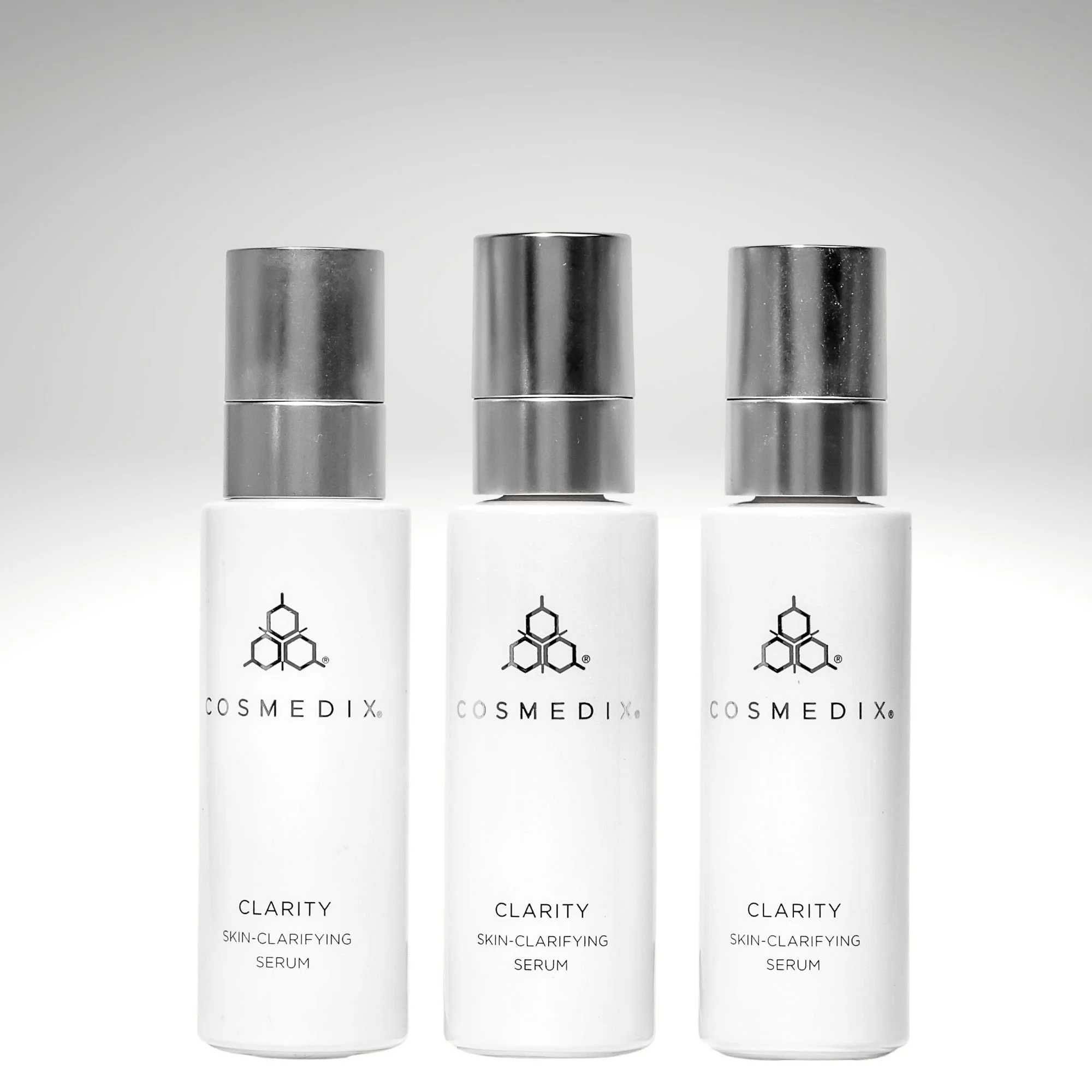 Cosmedix Clarity Serum, 3 bottles of Products side by side