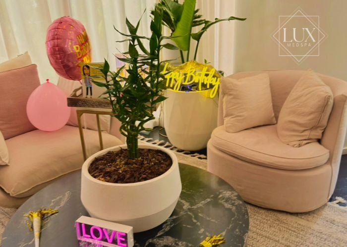Luxury spa day birthday celebration setup at Lux MedSpa Brickell in Miami lounge