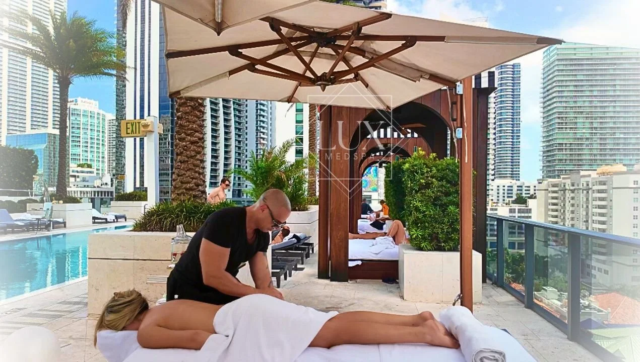Luxury massage experience at Lux MedSpa Brickell in Miami with skyline view